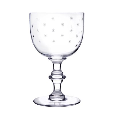 A Set Of Four Crystal Wine Goblets With Stars Design