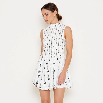 Sleeveless Smocked Mini Dress With High Neckline And Embroidered Bow Motif